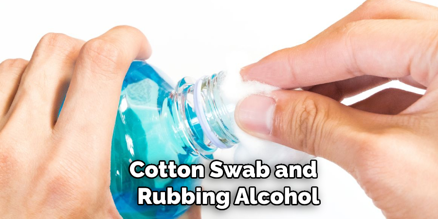 Cotton Swab and Rubbing Alcohol