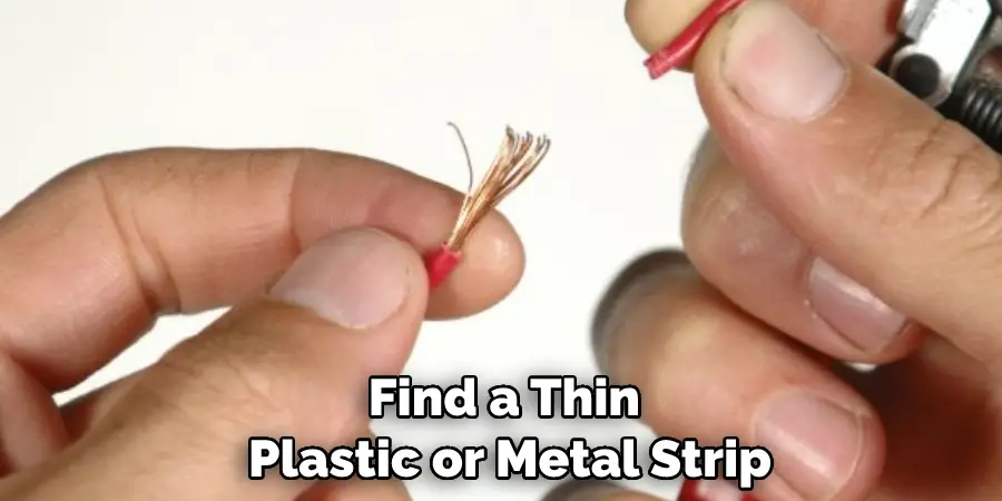 Find a Thin Plastic or Metal Strip