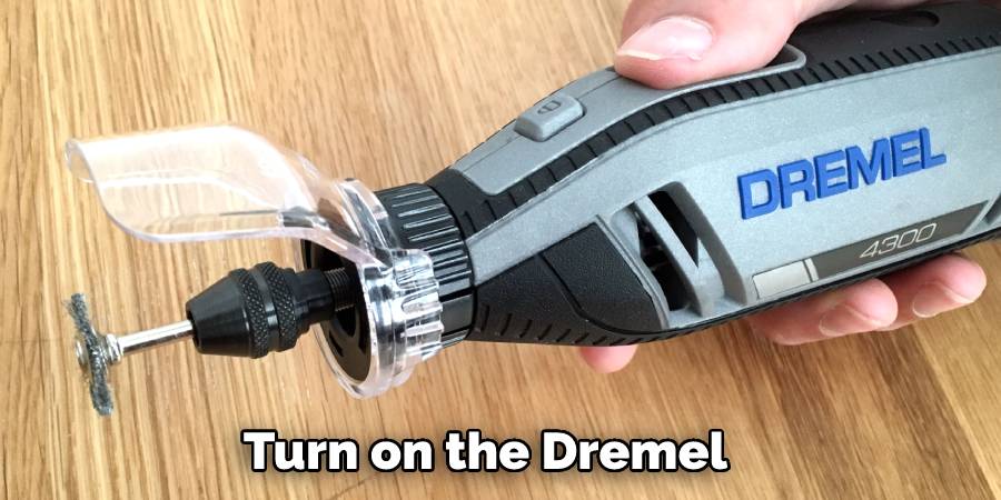 Turn on the Dremel 