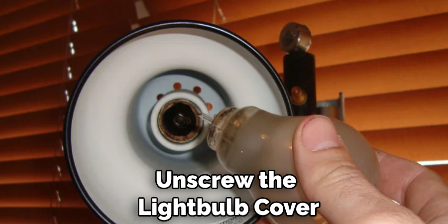 Unscrew the Lightbulb Cover