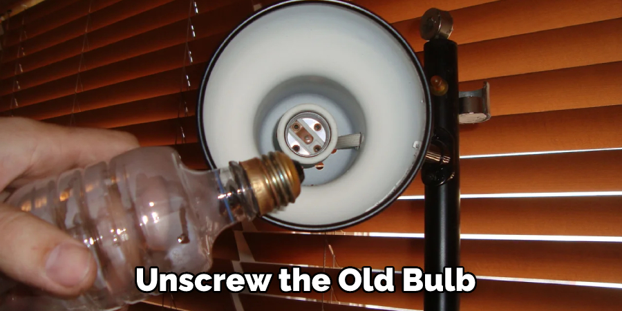 Unscrew the Old Bulb