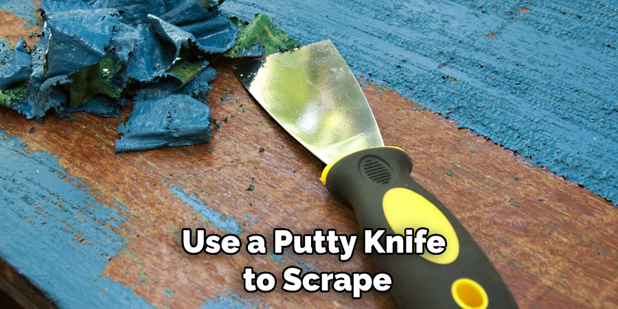 Use a Putty Knife to Scrape