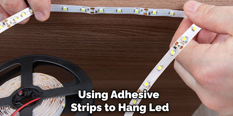 Using Adhesive Strips to Hang Led