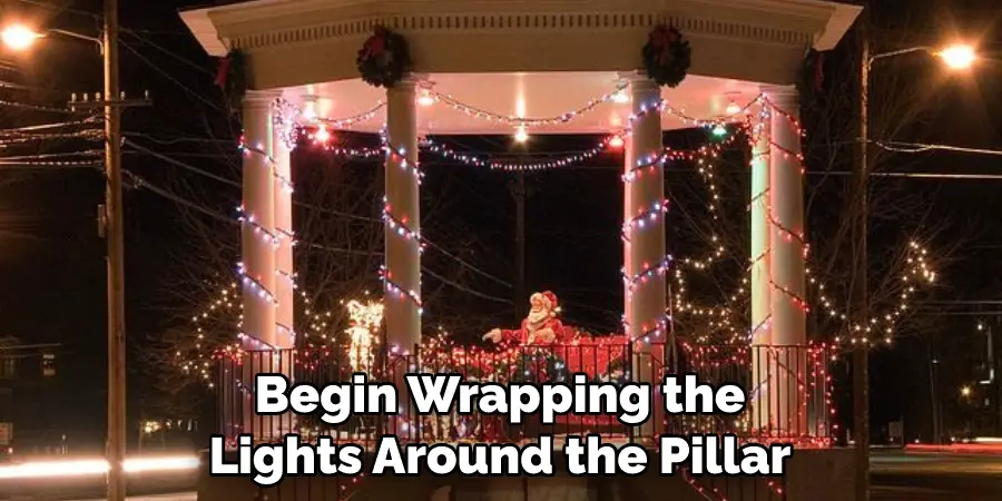 Begin Wrapping the Lights Around the Pillar