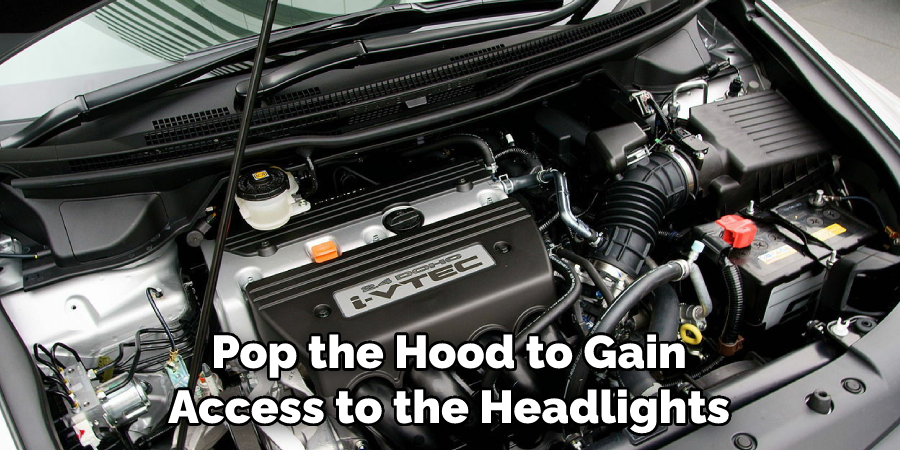 Pop the Hood to Gain Access to the Headlights