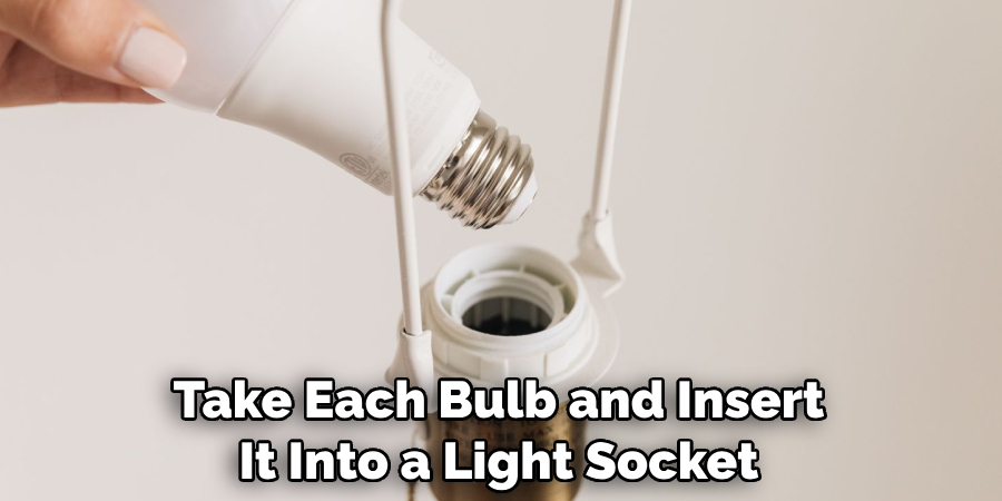Take Each Bulb and Insert It Into a Light Socket