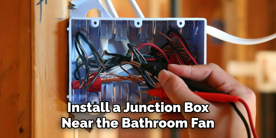 Install a Junction Box Near the Bathroom Fan