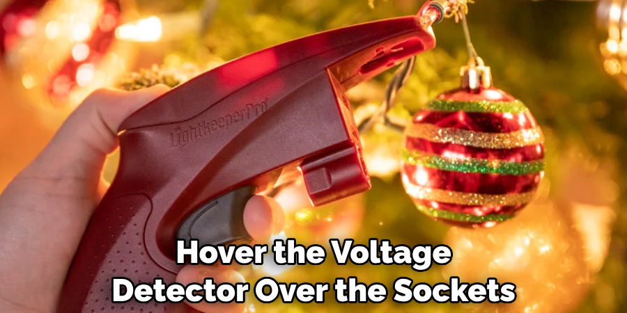 Hover the Voltage Detector Over the Sockets