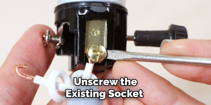 Unscrew the Existing Socket 