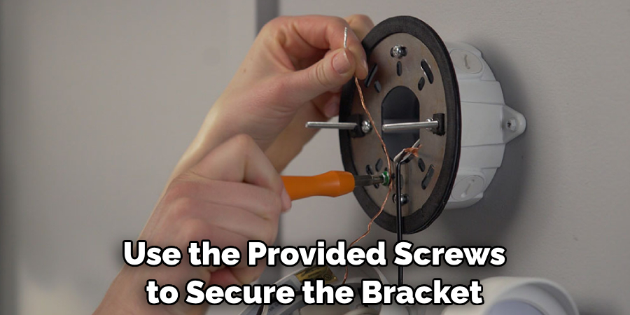 Use the Provided Screws to Secure the Bracket
