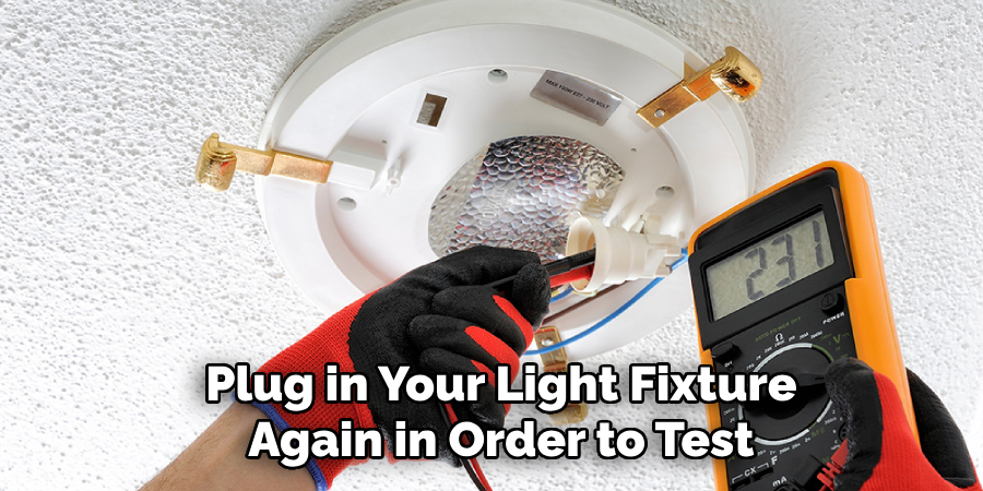 Plug in Your Light Fixture Again in Order to Test