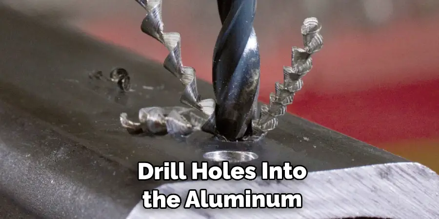  Drill Holes Into the Aluminum