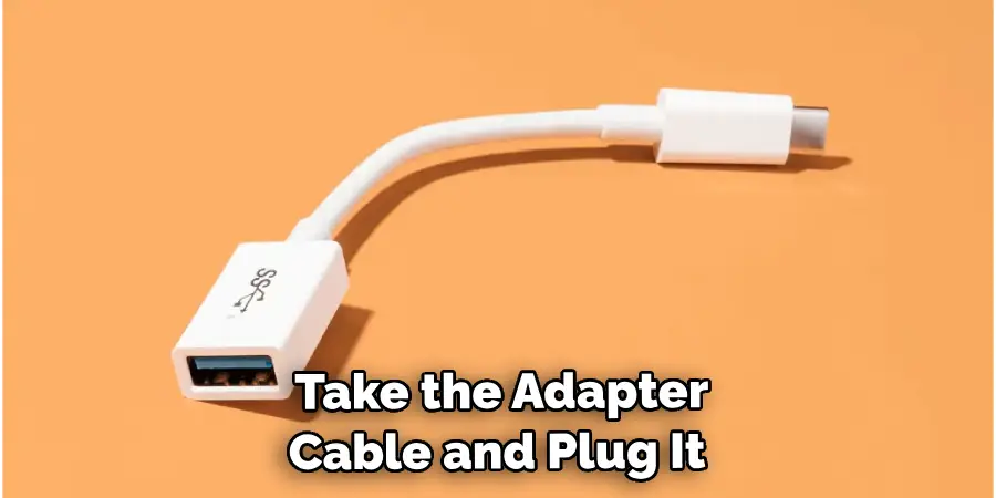  Take the Adapter Cable and Plug It 