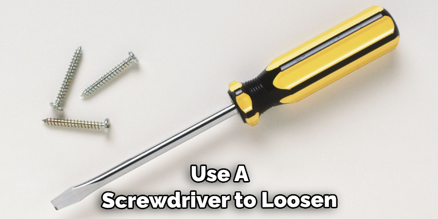  Use a Screwdriver to Loosen