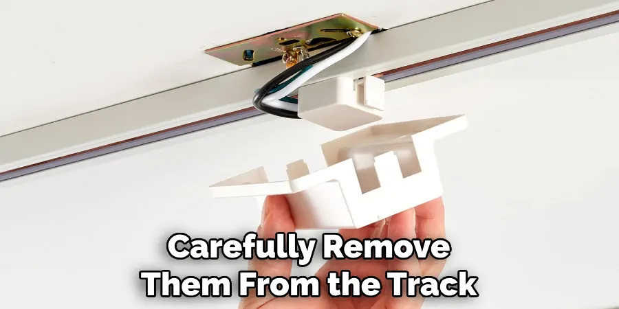 Carefully Remove Them From the Track