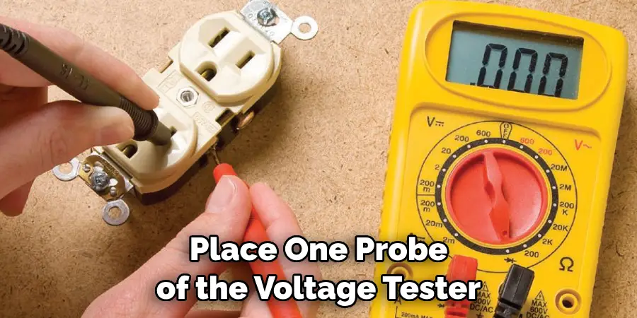 Place One Probe of the Voltage Tester