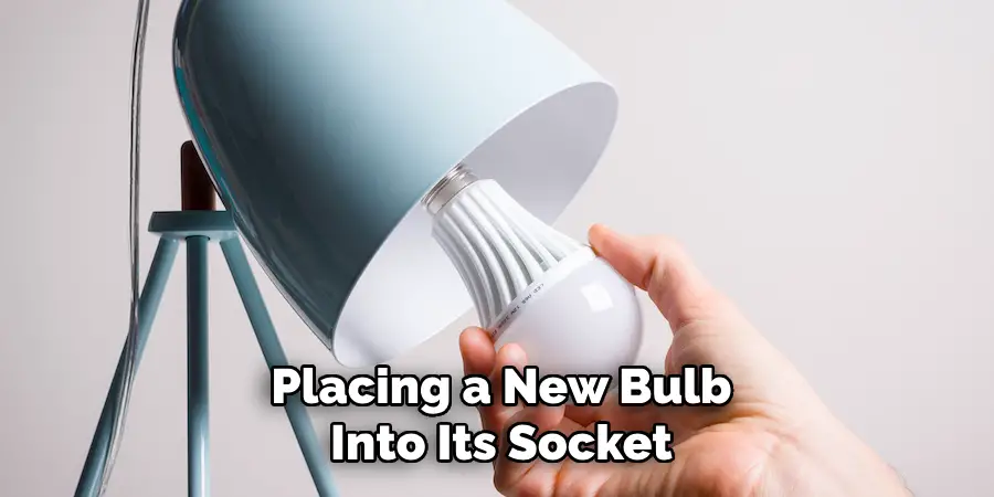 Placing a New Bulb Into Its Socket