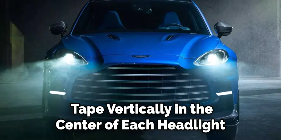 Tape Vertically in the Center of Each Headlight