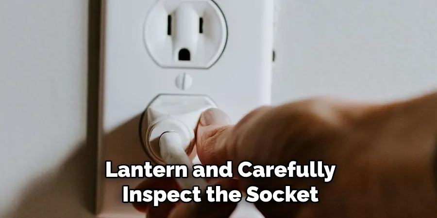 Lantern and Carefully Inspect the Socket