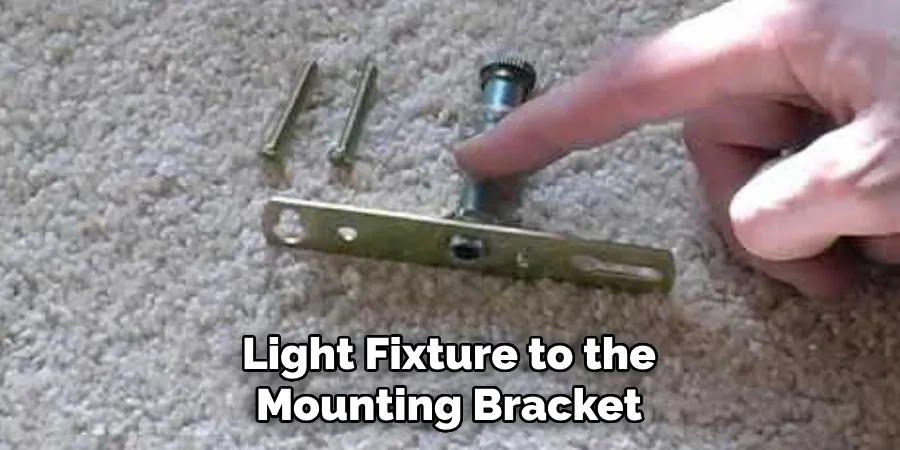 Light Fixture to the Mounting Bracket