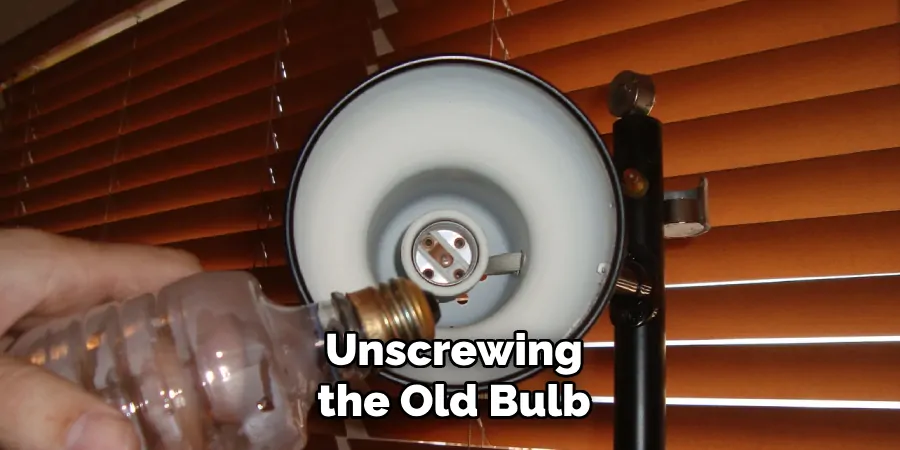 Unscrewing the Old Bulb