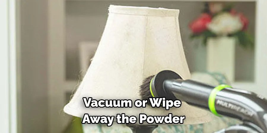 Vacuum or Wipe Away the Powder