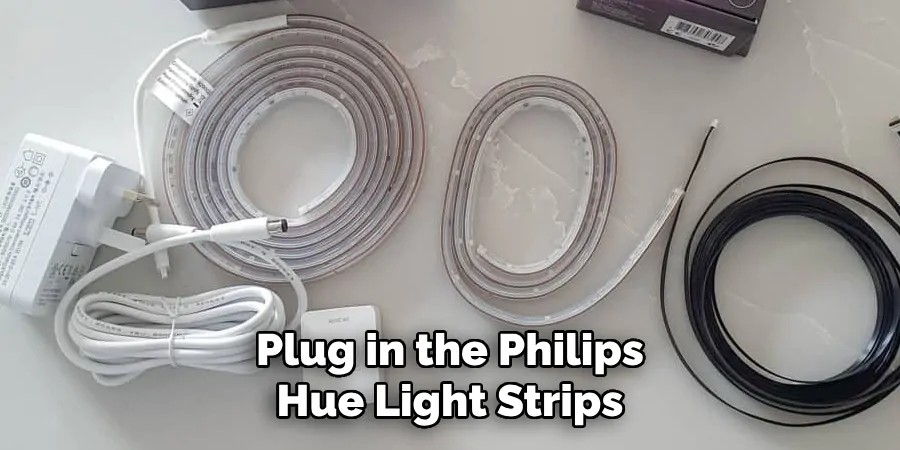 Plug in the Philips Hue Light Strips