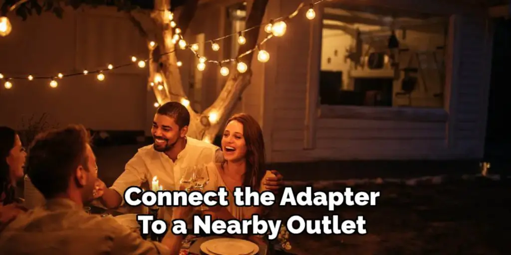 Connect the Adapter
To a Nearby Outlet