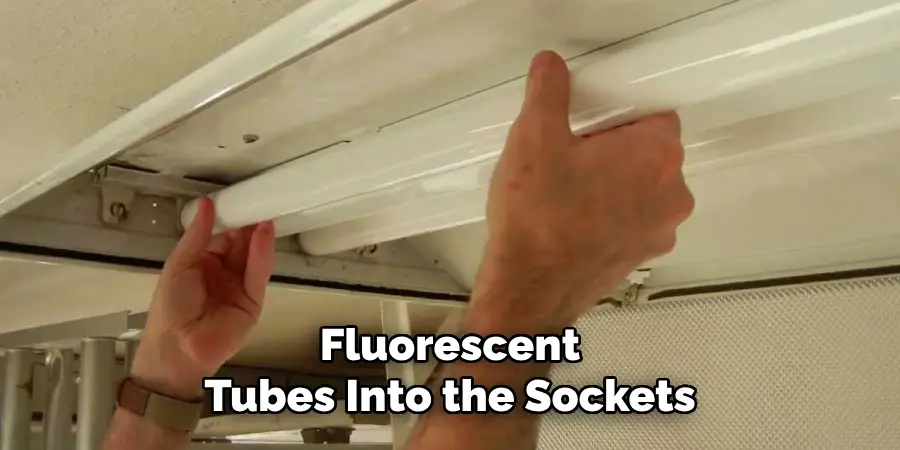 Fluorescent
Tubes Into the Sockets