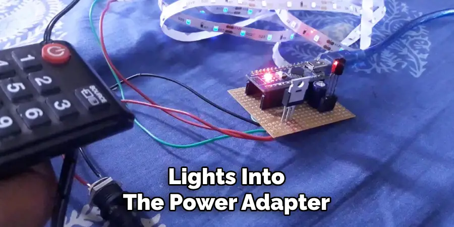 Lights Into
The Power Adapter