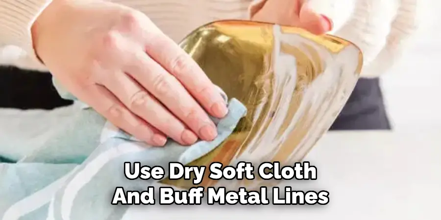 Use Dry Soft Cloth
And Buff Metal Lines