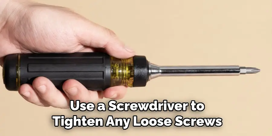 Use a Screwdriver to Tighten Any Loose Screws