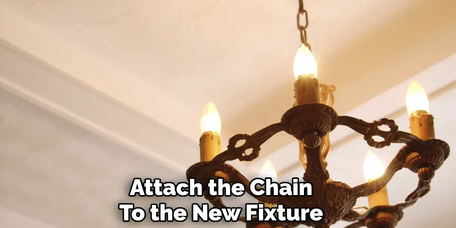 Attach the Chain
To the New Fixture 