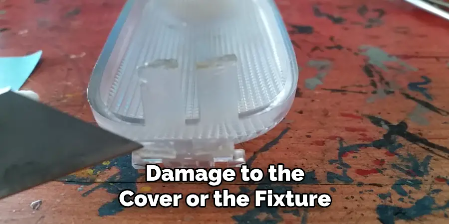 Damage to the
Cover or the Fixture