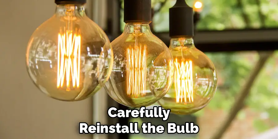 Carefully
Reinstall the Bulb