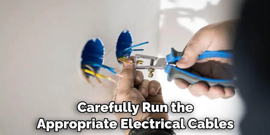 Carefully run the appropriate electrical cables
