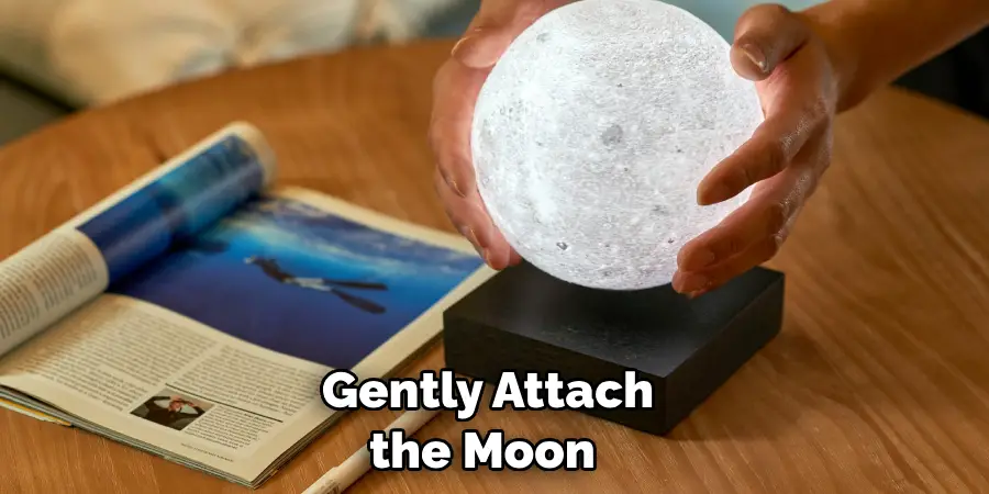 Gently Attach the Moon 