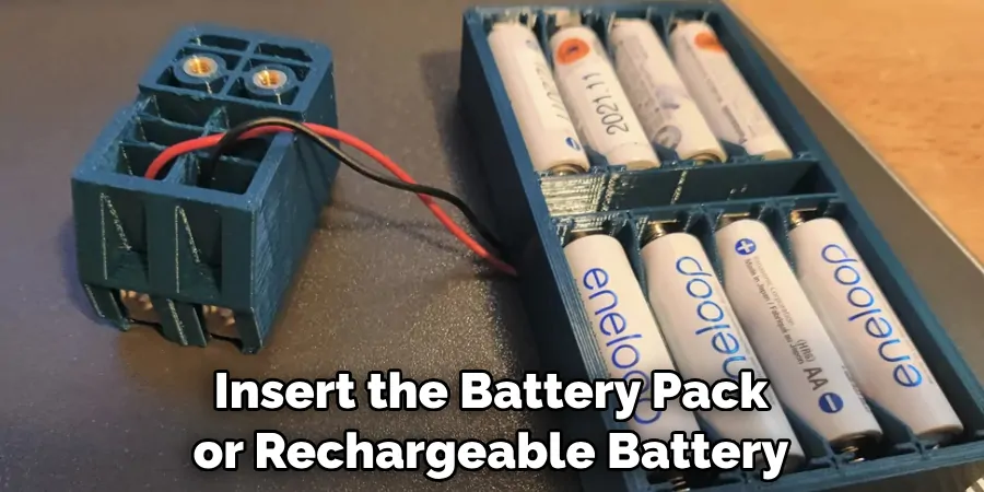 Insert the Battery Pack or Rechargeable Battery