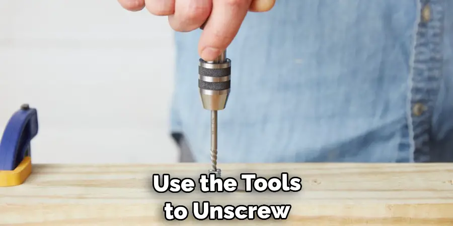 Use the Tools to Unscrew