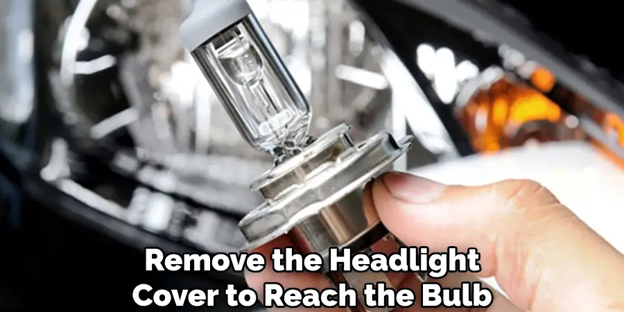 remove the headlight cover to reach the bulb