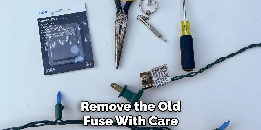 Remove the old fuse with care