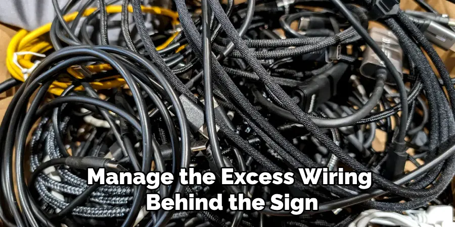 Manage the Excess Wiring
 Behind the Sign